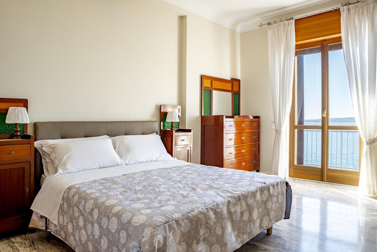 Ortigia Seafront Apartment By Wonderful Italy Сиракузы Экстерьер фото